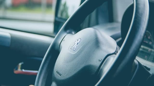 Jeep maker Stellantis posts first annual loss in company history after EV writedowns