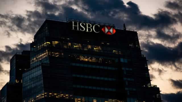 HSBC raises returns outlook as profits drop less than expected